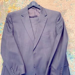 46 Regular, Traditional Cut, Navy Pinstripe, Flat front pants and single vent.